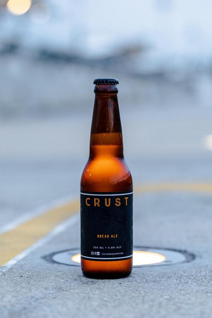 今回、日本で発売が決定したのは、売れ残りのパンで製造したCRUSTの代名詞ともいえるクラフトビール「CRUST」に加え、とある余剰食材で製造した炭酸飲料「CROP」をリリース予定（詳細、近日公開予定）。
両商品は2020年12月末～2021年1月の間に正式提供販売を予定しております。   